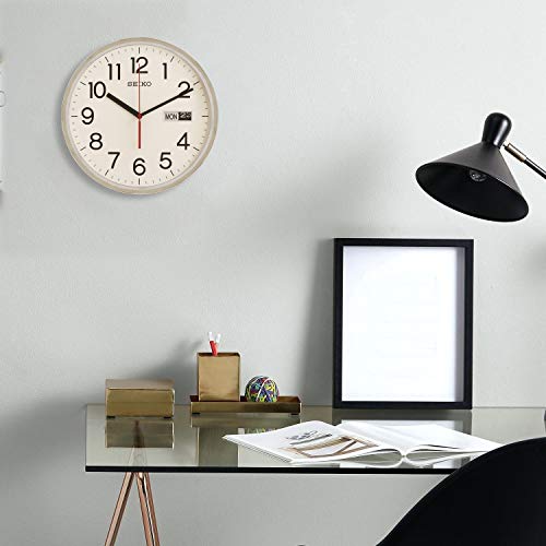 Image of Seiko Unique Round Silver Plastic Analog English Numbers Day /Date Home Decor Wall Clock (Size: 30.3 x 6.4 x 30.3 CM | Weight: 990 gram | Color: Silver)
