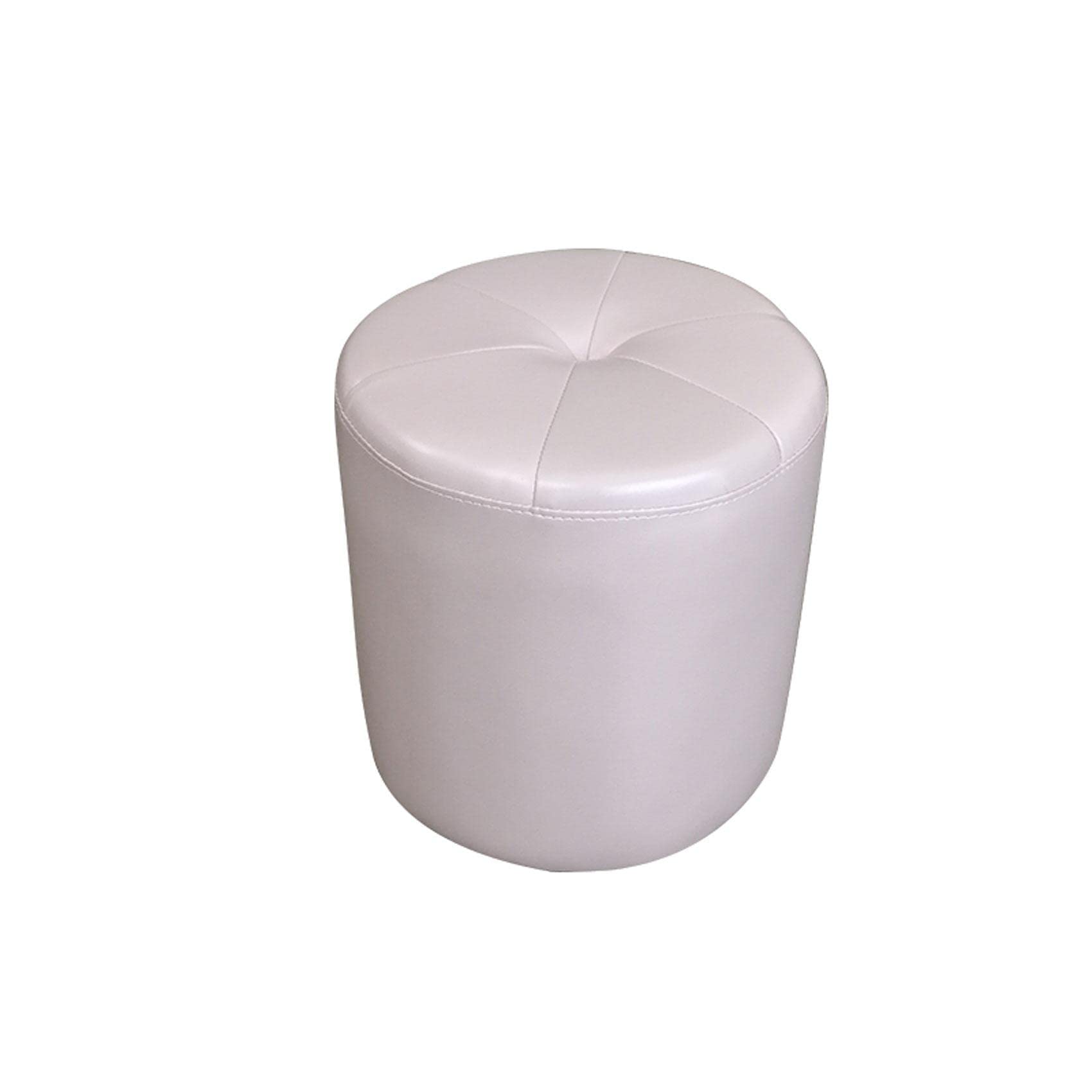 Tabouret en peau de vache rose pour créer un coin lecture cosy