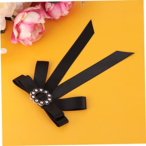 Broche bowknot en strass idéale sur une cape pour les soirées