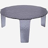 La table basse en verre bullé Fegina dispose d'un grand plateau rond aux bords irréguliers. Elle est idéale pour compléter un espace salon moderne et élégant.