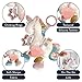 Itzy Ritzy Link & Love Toy for Stroller or Car Seat; Features Textured Ribbons, Crinkle Sounds, Clinking Rings & Silicone Teether; Designed For Ages 0 Months and Up (Unicorn)
