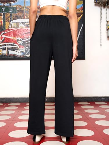 Image of Bewakoof Women's Cotton Relaxed Fit Track Pant | Track pants for woman | Lower for women | Multipurpose | Activewear | Utility Pockets | Lightweight & Flexible Elastic Waist | Casual Joggers | Loose Fit