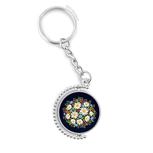 Flor de la fruta en un llavero giratorio Pilgrim de crisantemo blanco para no perder las llaves