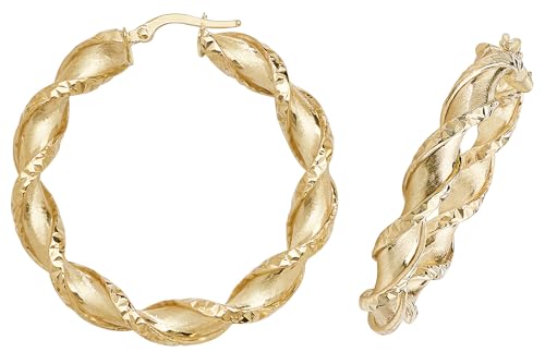 Boucles d'oreilles or jaune femme créoles élégantes du bureau aux soirées