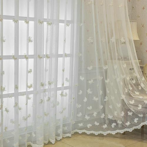 Voilage brodé blanc en polycoton pour sublimer la chambre à coucher