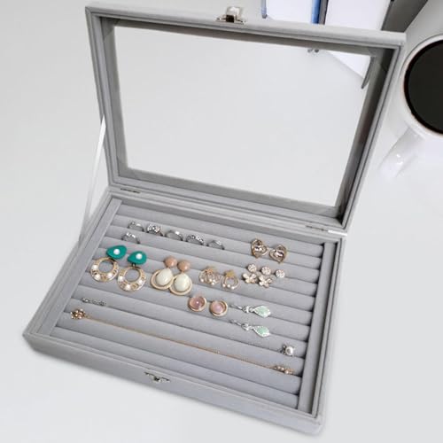Boutons de manchette et bagues rangés sur ce plateau vitrine - 6