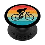 fahrräder 70er jahre Sportliches Design mit Retro-Farben in einem Sonnenuntergang, inspiriert vom Vintage-Stil der 70er oder 80er Jahre mit der Silhouette eines Radfahrers