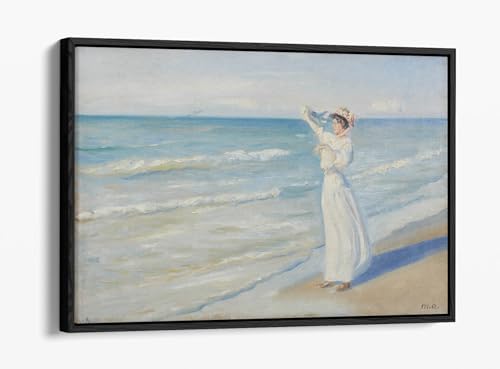 Cadre noir toile femme sur une plage grand format pour mur vide