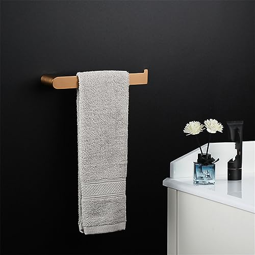 Accessoires de salle de bain or rose pour une décoration moderne et épurée