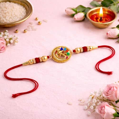 Image of JAIPUR ACE Designer Gold Plated Om Rakhi with Multicolor Stones - Premium Raksha Bandhan Thread for Brother, Elegant Ganesha Rakhi with Red String, Beads & Festive Traditional Finish (Golden Om rakhi)