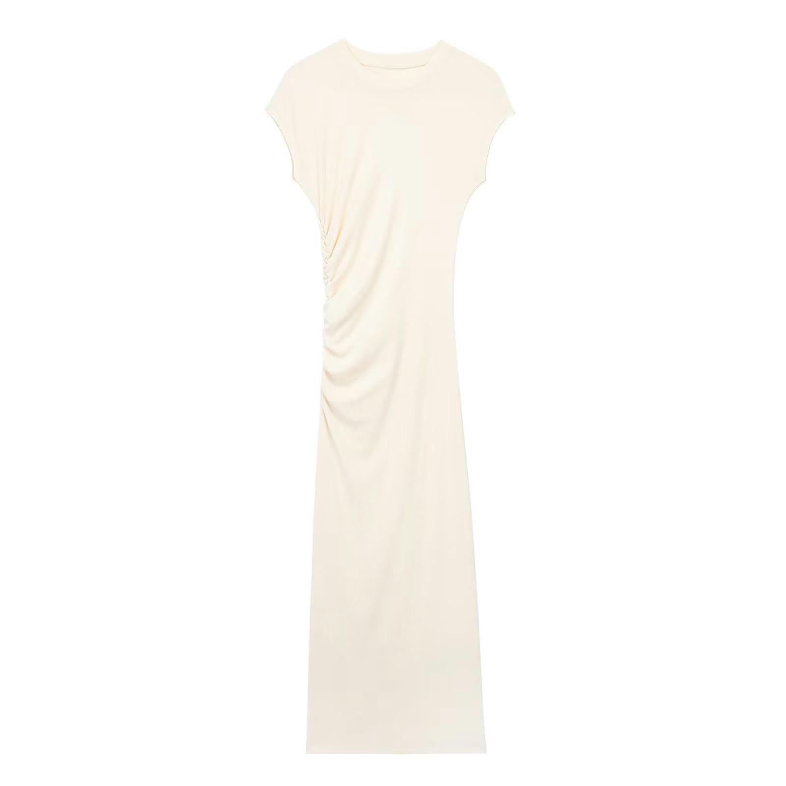Robe tricotée blanche à drapé chic idéale pour vos sorties printanières