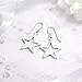 AeraVida Symmetric Shining Star Sterling Silver Celestial Dangle Earrings | Minimalist Everyday Wear | Handmade 0.87x1.38 Inch Star Earrings for Women