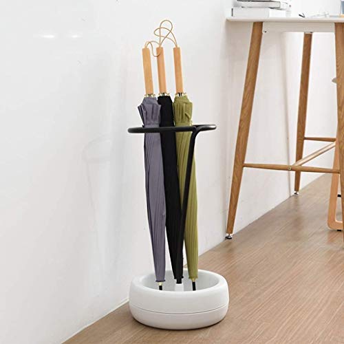 Support de rangement parapluie compact pour éviter les sols mouillés