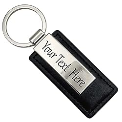 black keychain that reads "Your text Here"