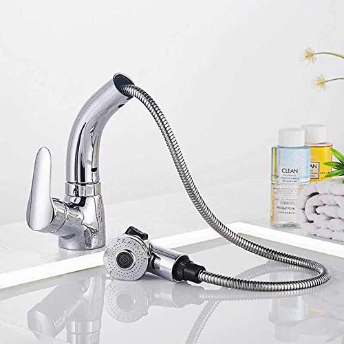 Robinet d'évier finitions or et chrome pour une salle de bain haut de gamme