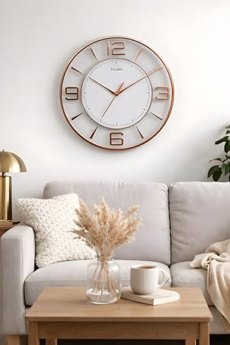 Image of Amazon Brand - Solimo 12 Inches Silent Wall Clock for Living Room Bedroom Office Wooden Look Plastic 3D Easy to Read Numbers Modern Stylish Sweep Movement Wall Clock for Home - 1611TS (White Copper)