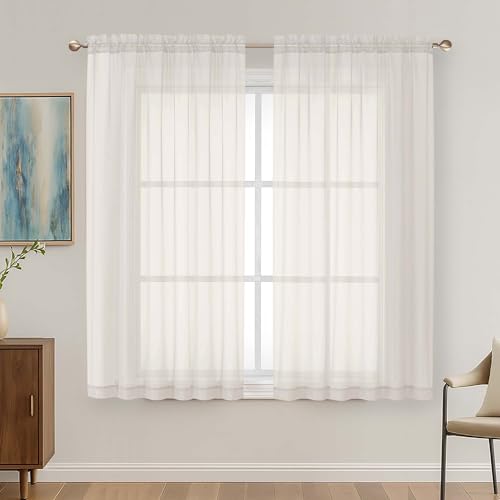 Image of OVZME Ivory Sheer Curtains 63 Inches Long 2 Panels Set, Light Filtering Sheer Curtains for Living Room Bedroom 59 Inch Extra Wide, Modern Voile Filmy Rod Pocket Window Drapes, 59Wx63L Inches