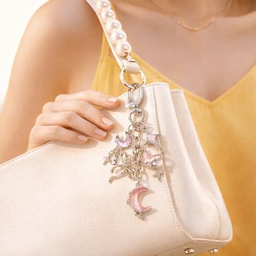 Image of Zibuyu Silver Alloy Keychain, Pink Moon Star Butterfly Dangle Bag Charm | Adds Style to Bags, Helps Locate Keys, Silver Alloy, Multi-Chain Dangle, Pearl Bow Accents, Wipe Clean