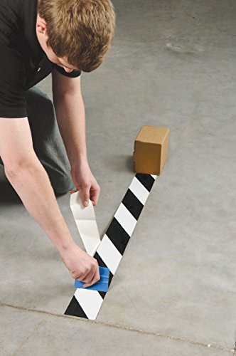 Image of Brady ToughStripe Nonabrasive Diagonal Stripes Floor Marking Tape, 100' Length, 2 inch Width, Black on White (Pack of 1 Roll) - 104319 | Nonabrasive black-and-white diagonal tape measures 2 in x 100 ft for marking aisles, hazards, equipment, and boundaries.