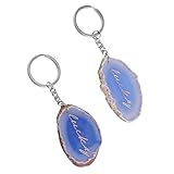 Glücks-Schlüsselanhänger: Auf dem Stein ist ein goldenes Wort 