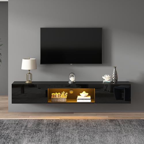 【Finitura Lucida Moderna】La superficie frontale con finitura lucida conferisce al mobile TV un aspetto elegante e attuale. Il colore nero valorizza l’arredamento del soggiorno e si abbina facilmente a diversi stili di interni, mantenendo una superficie facile da pulire e adatta all’uso quotidiano.