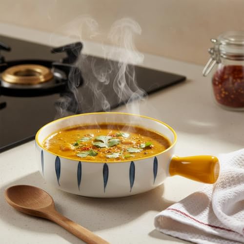Image of Amazon Basics Ceramic Snack Bowl with Handle | White & Blue Serving Bowl with Yellow Handle | Microwave & Dishwasher Safe Big Bowl Perfect for Snacks, Noodles, Salads, Soup, Baking (700ml)