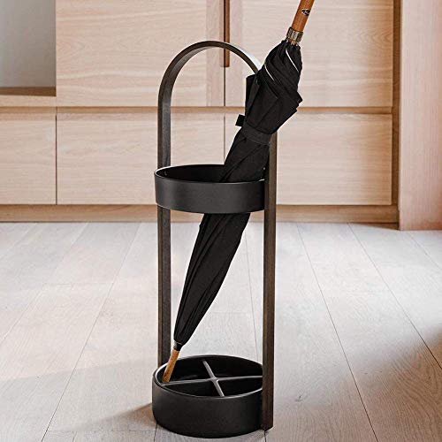 Seau de parapluie créatif en fer pour un hall d'hôtel toujours sec