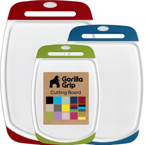Image of GORILLA GRIP BPA-Free Reversible Kitchen Cutting Board Set of 3, US Designed, Nonporous, Juice Grooves Catch Liquid, Slip Resistant Border, Dishwasher Safe Large Food Chopping Boards, Red Blue Green