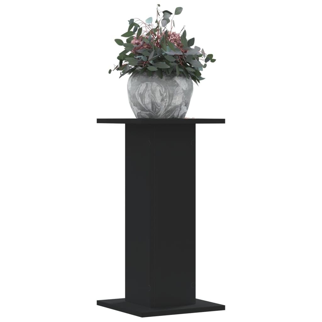 Support de plante en bois noir pour surélever les pots sur la pelouse