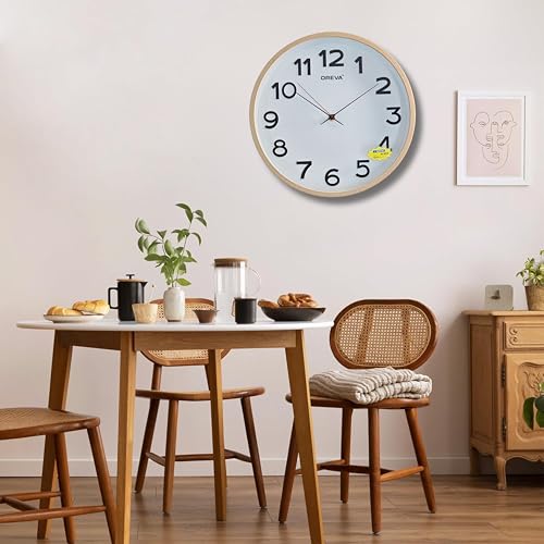 Image of OREVA 14 Inch Round Fancy Embossed Number Dial Contemporary Stylish Quartz Clocks Modern Analog Silent Wall Clock for Living Room Bedroom Home Decor Office AQ-9467SS