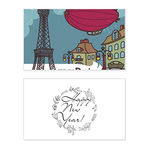 Tarjeta de felicitación de año nuevo con la Torre Eiffel de Francia y dirigible de París