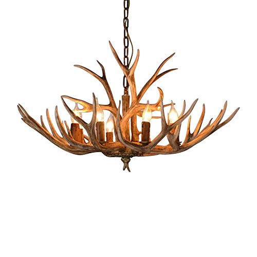 Lustre à 6 têtes en bois de cerf pour sublimer un salon au plafond haut