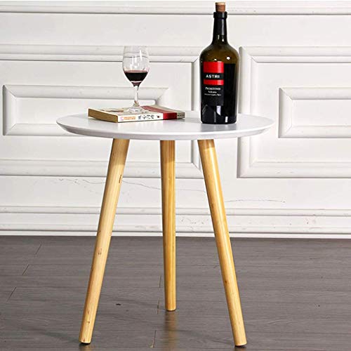 Table ronde bois massif compacte : la solution gain de place pour petit salon