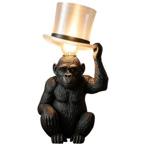 Singe ludique en résine pour chasser l'obscurité avec une lampe rétro