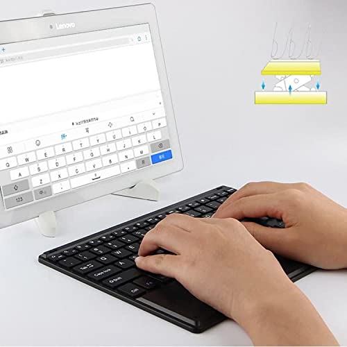 Person typing on the BoxWave SlimKeys Bluetooth Keyboard next to a tablet
