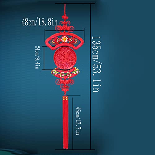 Nœud chinois avec pompon rouge sublime pour décorer votre salon