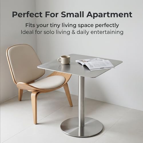 Mesa alta de acero inoxidable con base robusta y diseño elegante circular 6