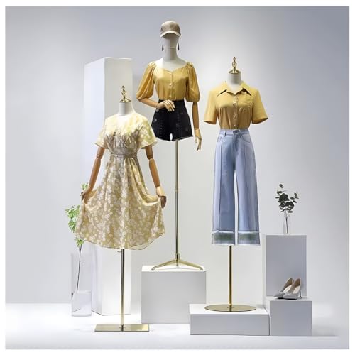 Présentoir pour mannequins et silhouettes mode dans une boutique haut de gamme