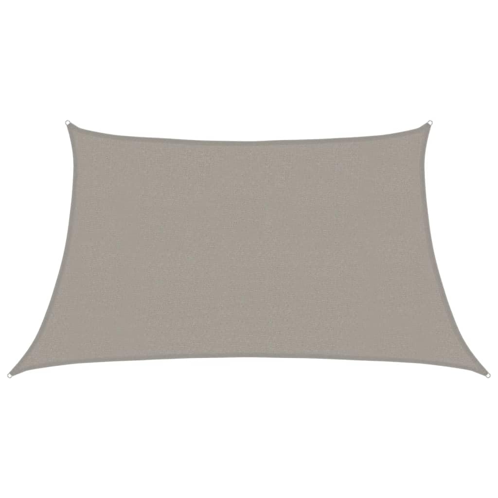 Voile parasol extérieur trapèze pour ombrager un salon de jardin