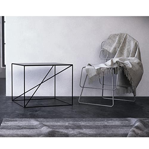 Table de chevet noire et support de canapé pour optimiser le rangement des petits salons - 7