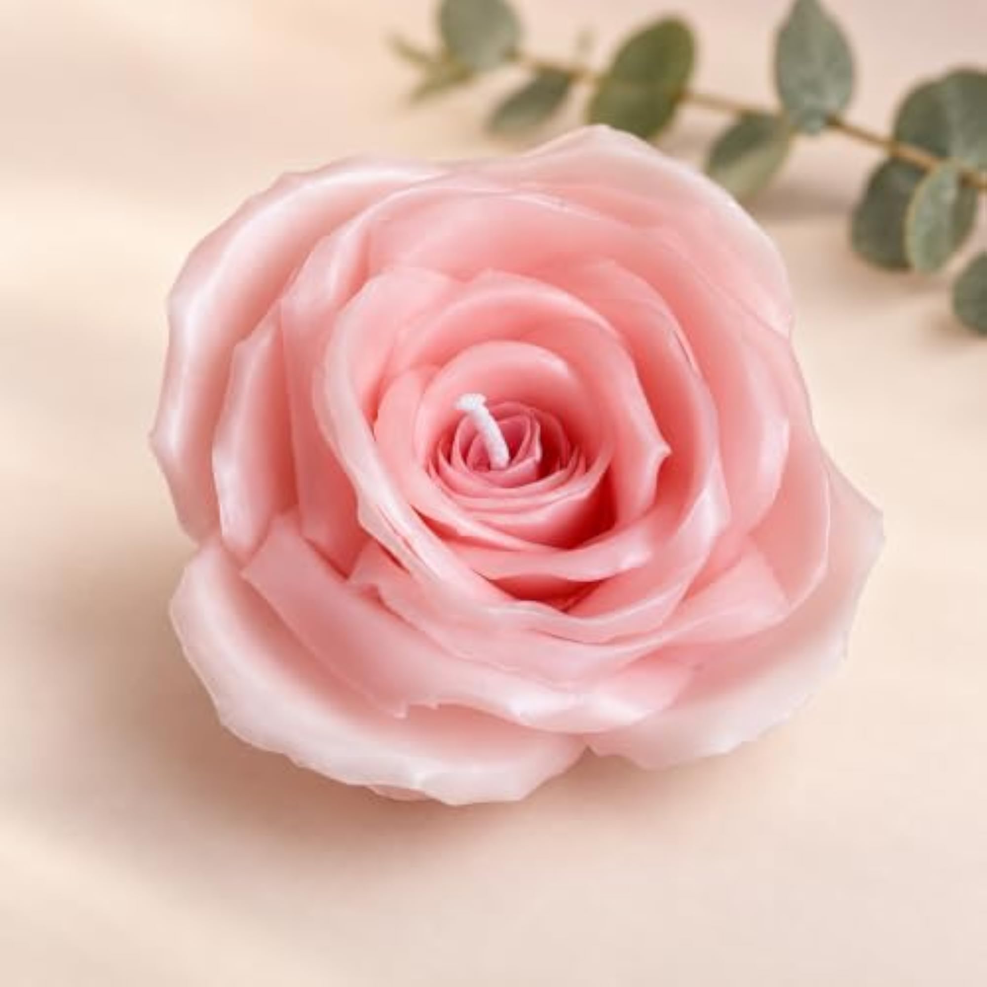 Handcrafted Pink Rose-Shaped Candle Presented as a Thoughtful Gift