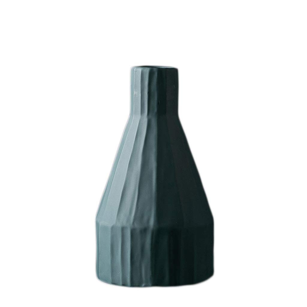 Vase céramique verte bordure dorée pour briser la monotonie d'une table