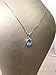 Solid 14K gold handmade blue topaz and diamond halo necklace
