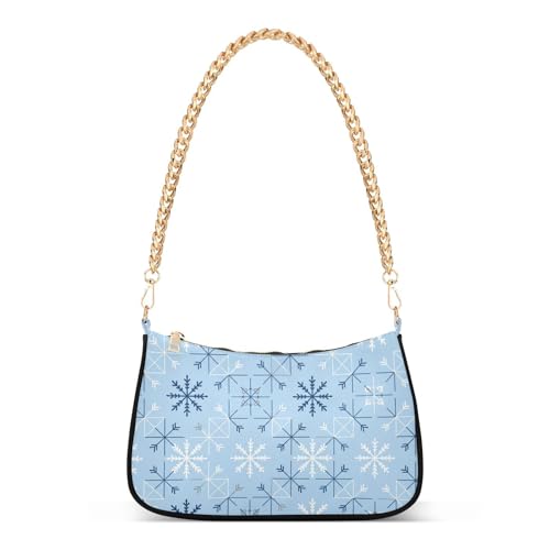 Sac à main tendance bleu et chaîne de Noël pour sublimer un look d'automne
