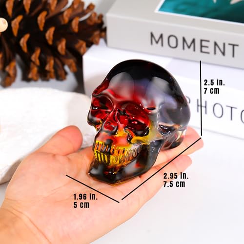 Figurines de tête de mort en cristal aux reflets incandescents
