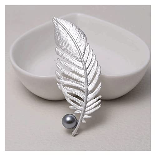 Broche mate en plumes pour customiser vos tenues ternes avec or et strass