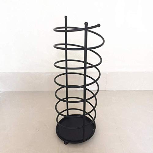 Porte-parapluie noir en forme de ressort pour entrée de restaurant moderne - 2