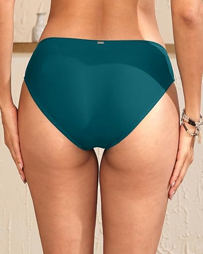 Image of Daci Women's Mid-Rise Full-Coverage Bikini Bottom | Mid-rise bikini bottom with full rear coverage in 82% nylon and 18% spandex for comfortable swimming and beachwear