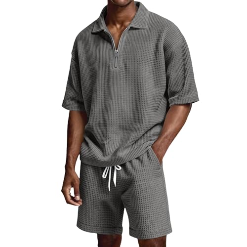 Fermeture éclair quart de haut sur ce survêtement d'été 2 pièces homme monochrome