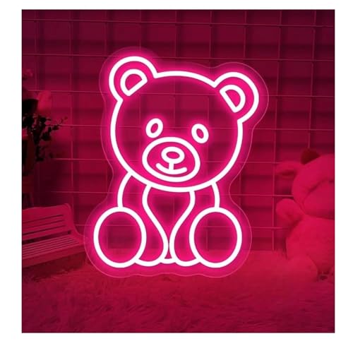 Lampe néon ours rose pour illuminer un mur sombre et décorer un salon terne